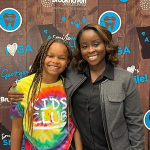 young girl and mom at orthodontist in Atlanta